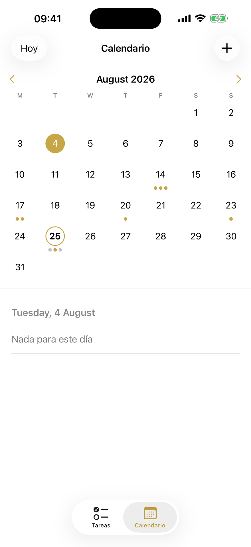 Calendario mensual de Koto con puntos de color en los días con tareas